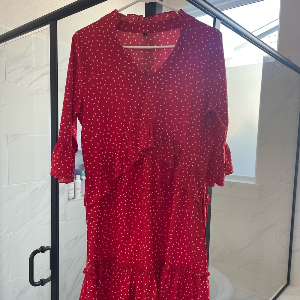Polkadot mini babydoll dress with ruffle sleeves and hem details